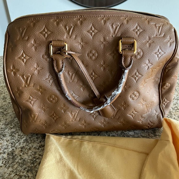 Louis Vuitton Bags Damaged Louis Vuitton Cognac Monogram Empreinte Speedy 3 Poshmark